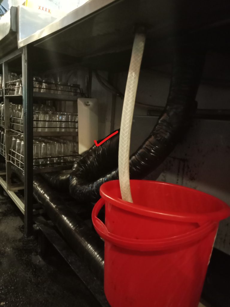 Fly Control dispenser under the bar for vinegar fly control